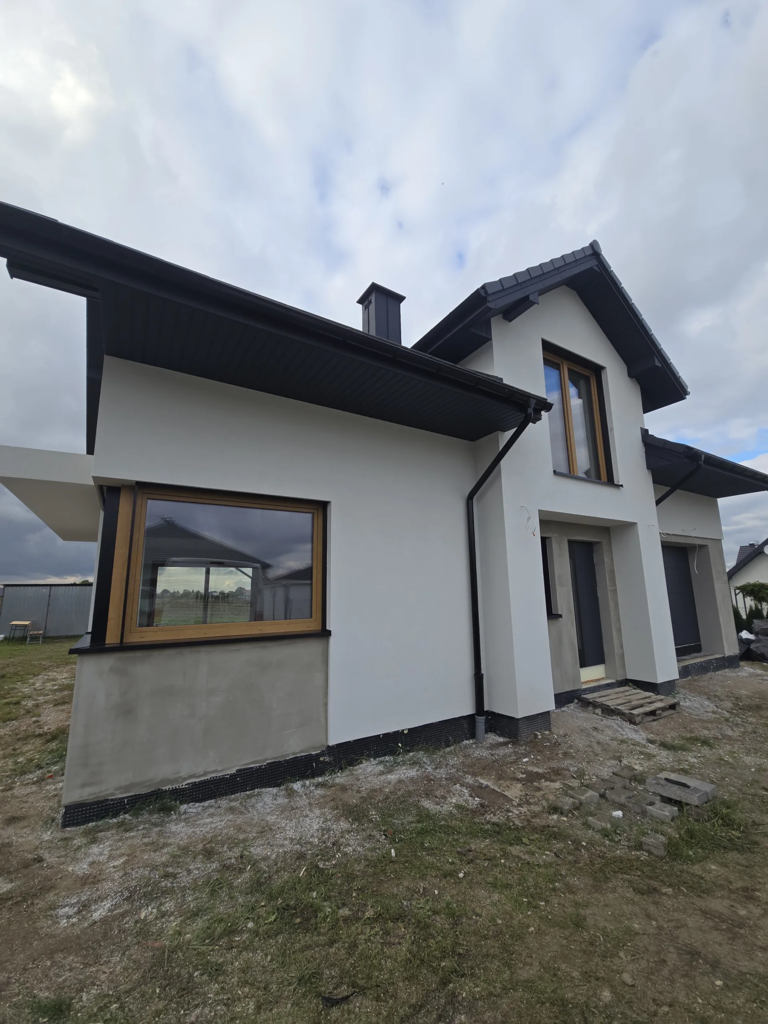 Ocieplenie budynku i elewacja - Pawęzów